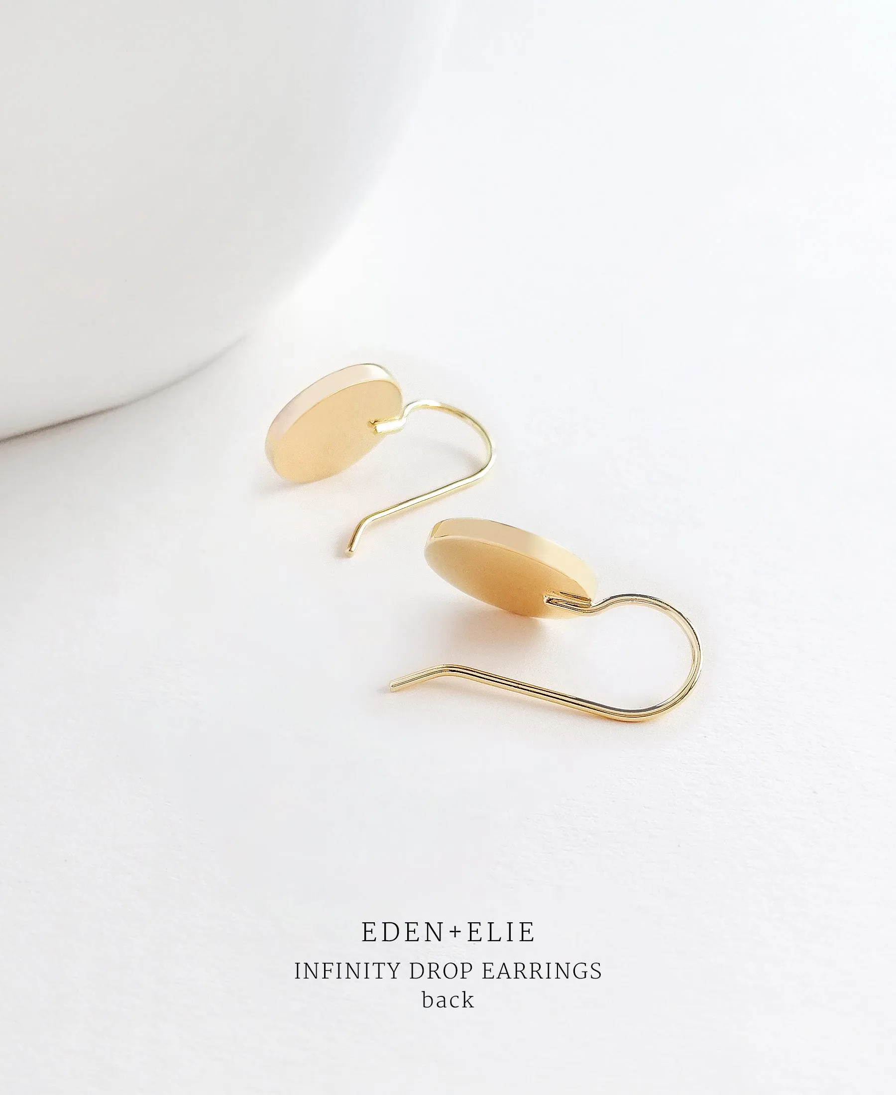 EDEN   ELIE Infinity drop earrings - shell